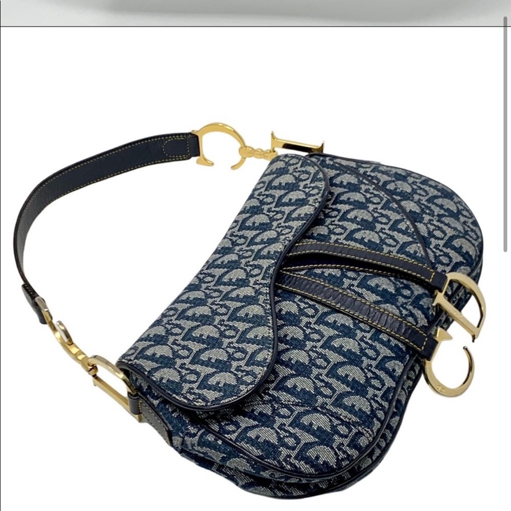 SOURCING  gold Authentic Dior CD hardware on the strap